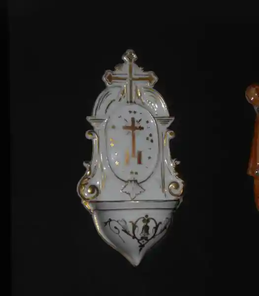 Cross with an H at the bottom